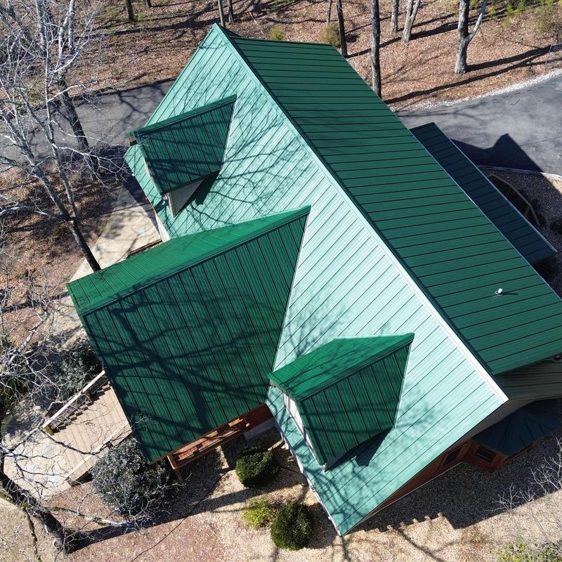Green metal roofing system with complex valleys and trims