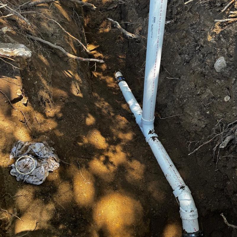 PVC pipe underground with two-way cleanout fitting