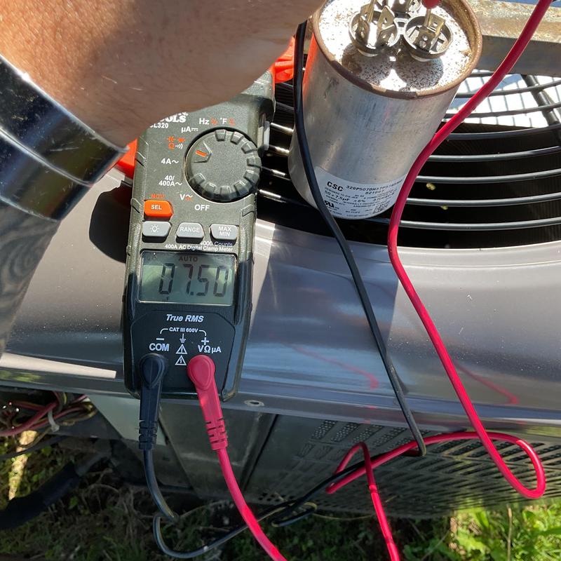 Capacitor and multimeter testing on HVAC unit Capacitor and multimeter testing on HVAC unit