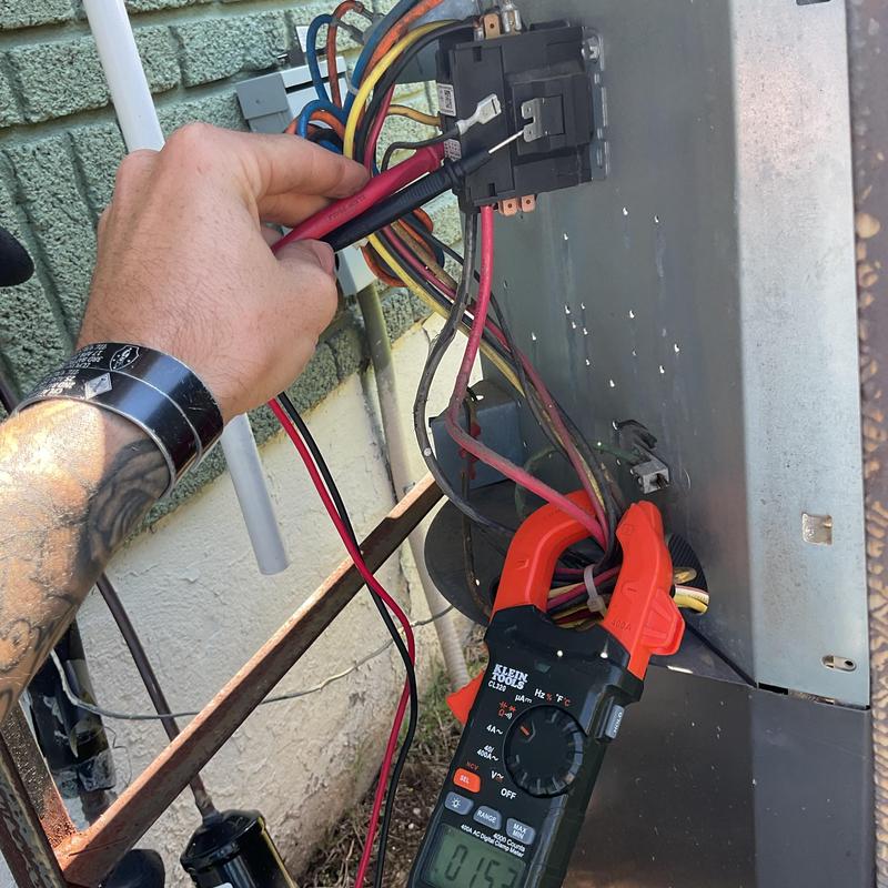 HVAC electrical connections testing with multimeter clamp HVAC electrical connections testing with multimeter clamp