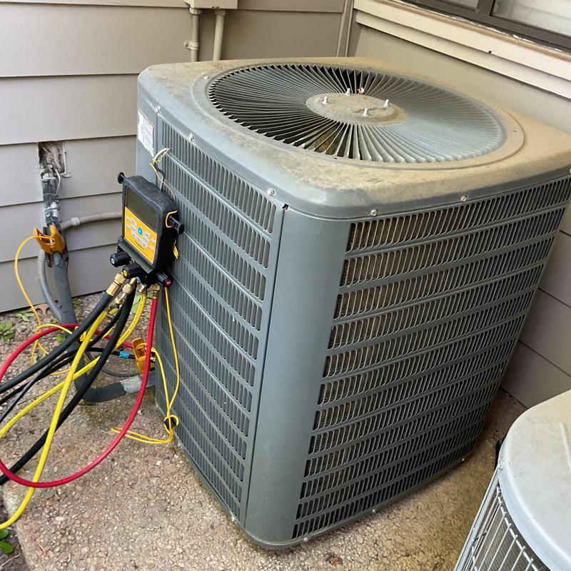 R22 air conditioning unit with diagnostic gauges attached R22 air conditioning unit with diagnostic gauges attached