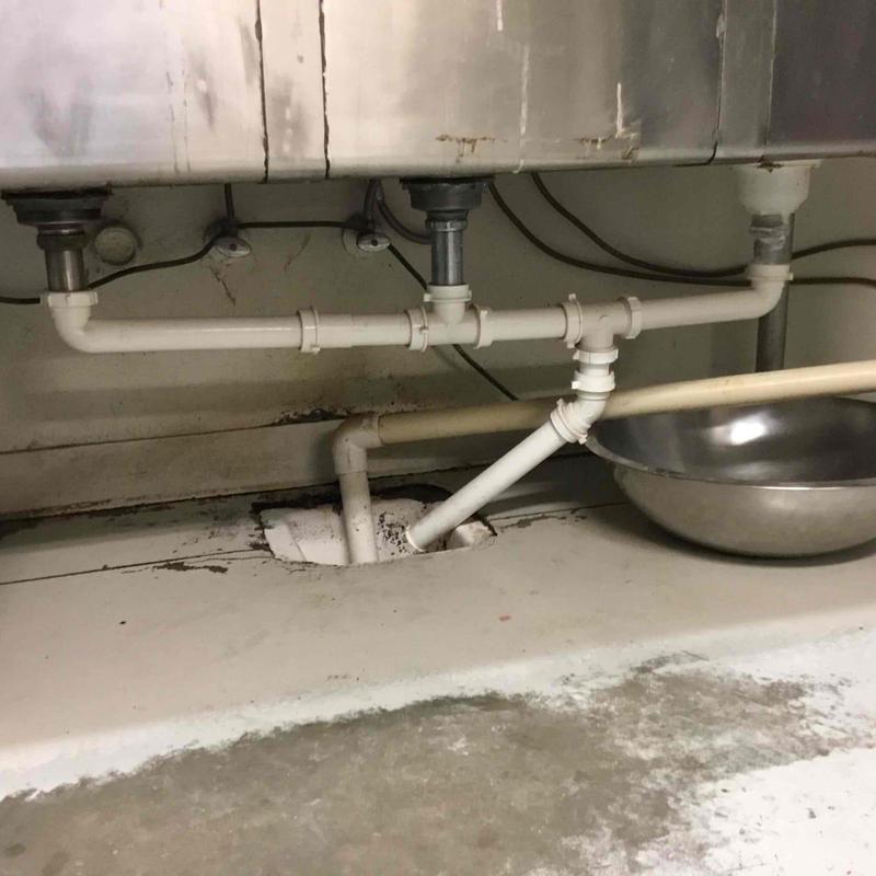 Under sink grease trap plumbing and drain connections