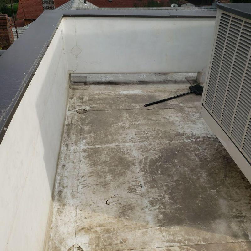 TPO flat roof with dirt and debris near HVAC unit TPO flat roof with dirt and debris near HVAC unit