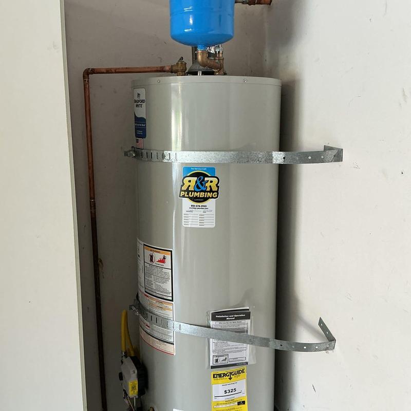 50-gallon gas water heater with pressure tank installed