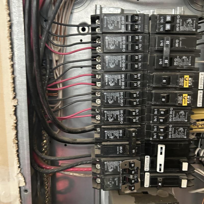 Electrical breaker panel with circuit wiring and breakers