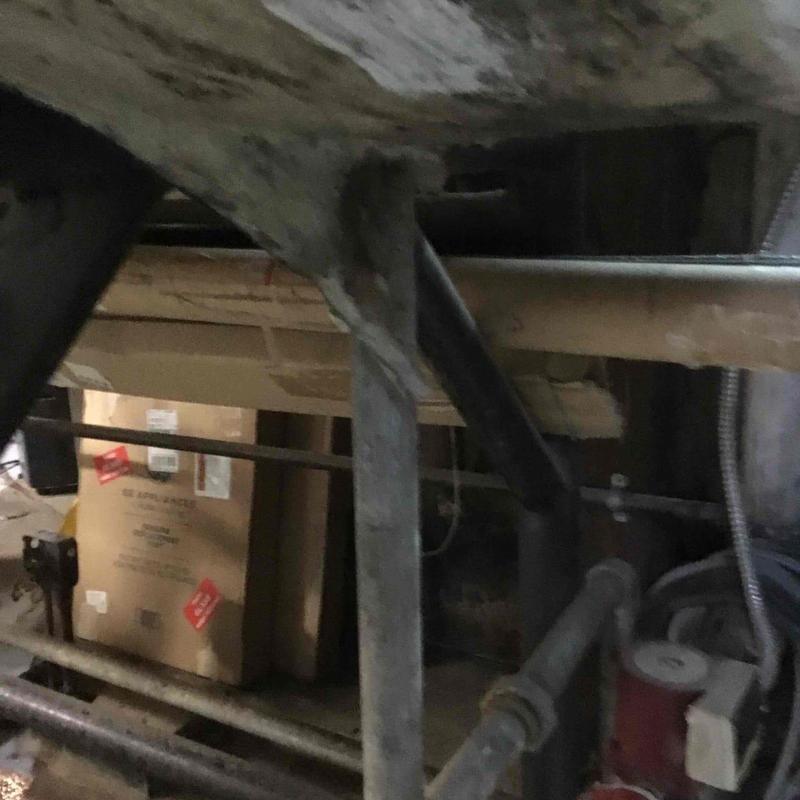 Leaking 800-gallon storage tank under boiler system Leaking 800-gallon storage tank under boiler system
