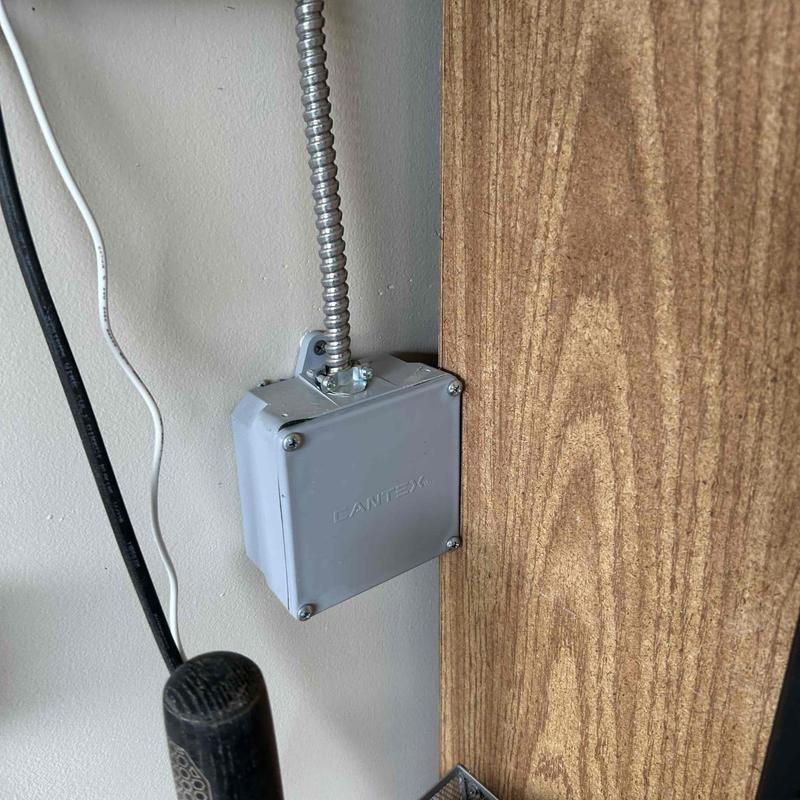 Solar Edge conduit box installation on wall panel Solar Edge conduit box installation on wall panel