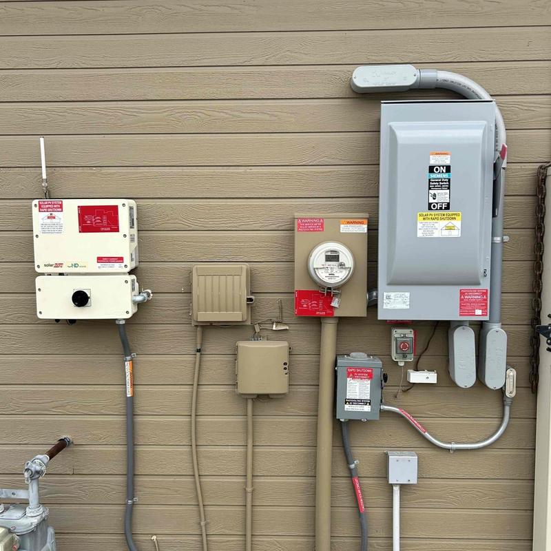 SolarEdge inverter with connected solar system components SolarEdge inverter with connected solar system components