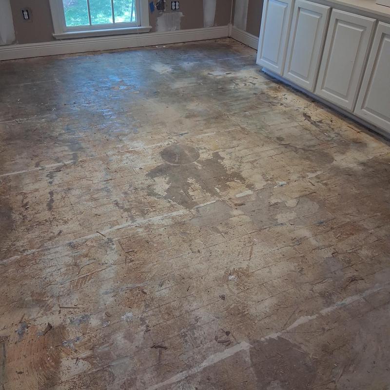 Subfloor demolition and prep in kitchen flooring area