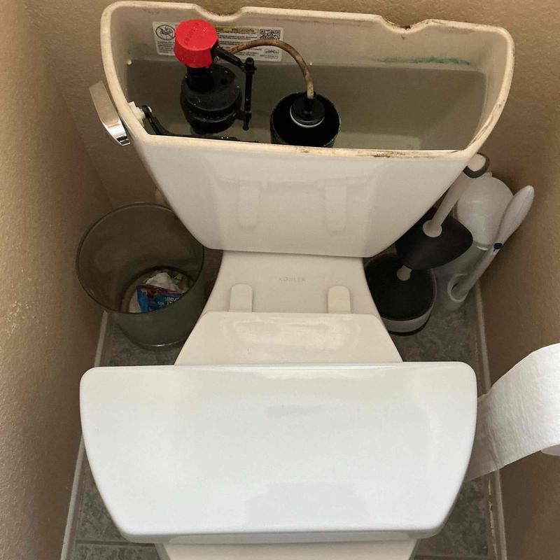 Toilet fill valve assembly inside tank