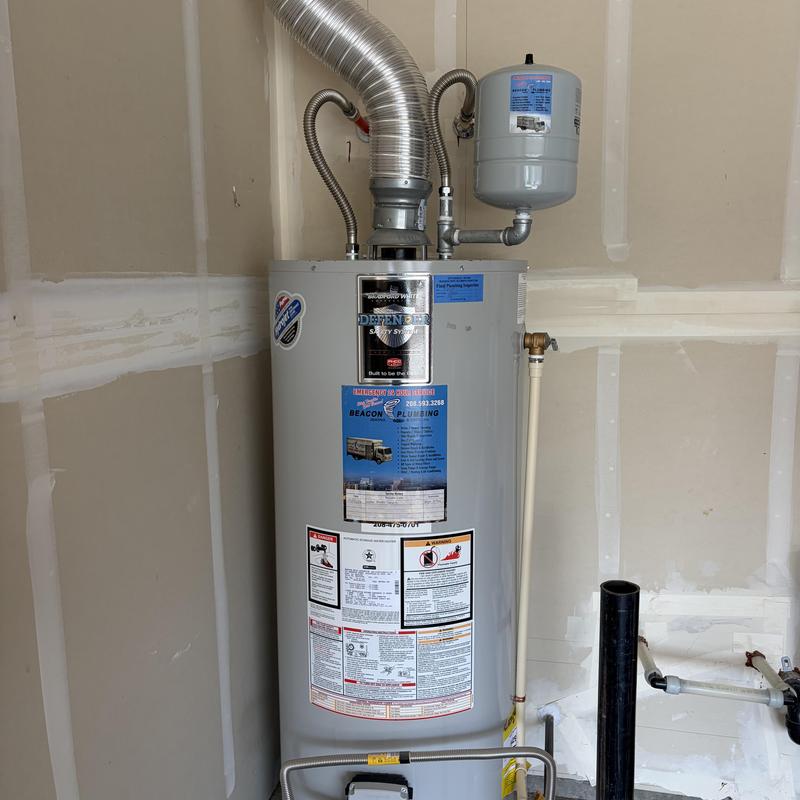 Water heater with flush and inspection in garage Water heater with flush and inspection in garage