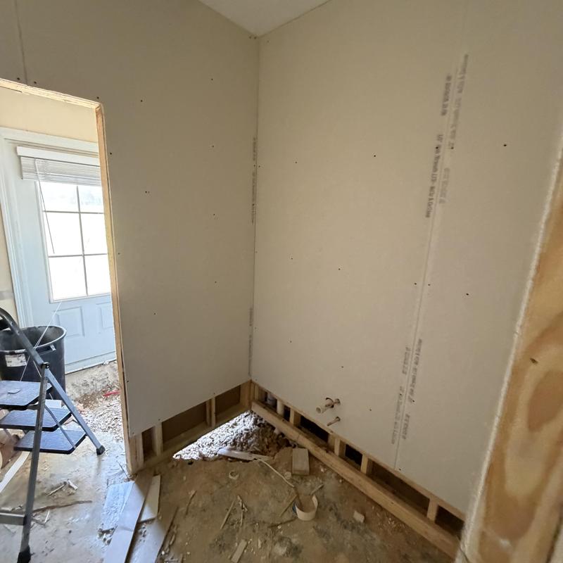 Sheetrock installation on interior wall remodel