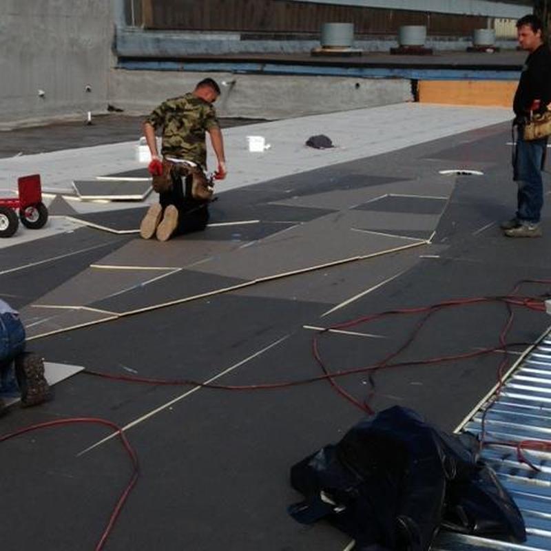 Polylso insulation installation on commercial roof Polylso insulation installation on commercial roof