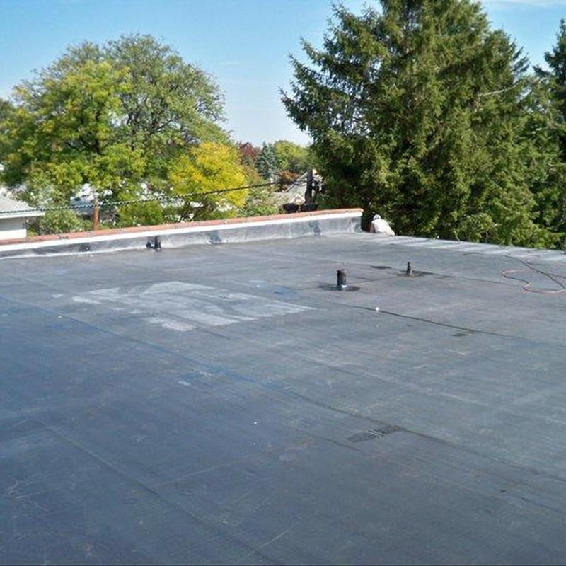 EPDM rubber membrane roof with flashing and vents EPDM rubber membrane roof with flashing and vents