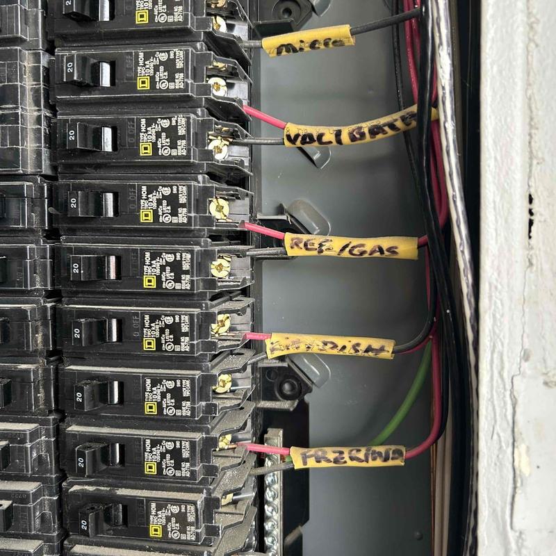 Electrical breaker panel with labeled two pole breakers installed Electrical breaker panel with labeled two pole breakers installed