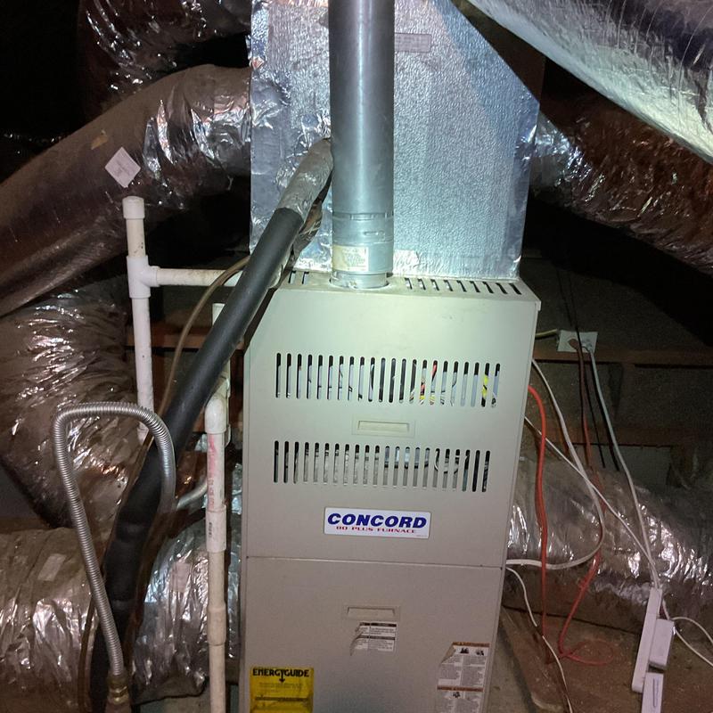 Gas furnace with ductwork and vent pipe in attic Gas furnace with ductwork and vent pipe in attic