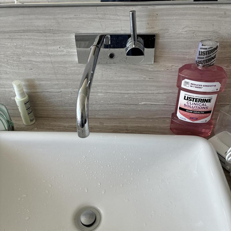 Wall-mounted kitchen faucet with lever handle installation Wall-mounted kitchen faucet with lever handle installation
