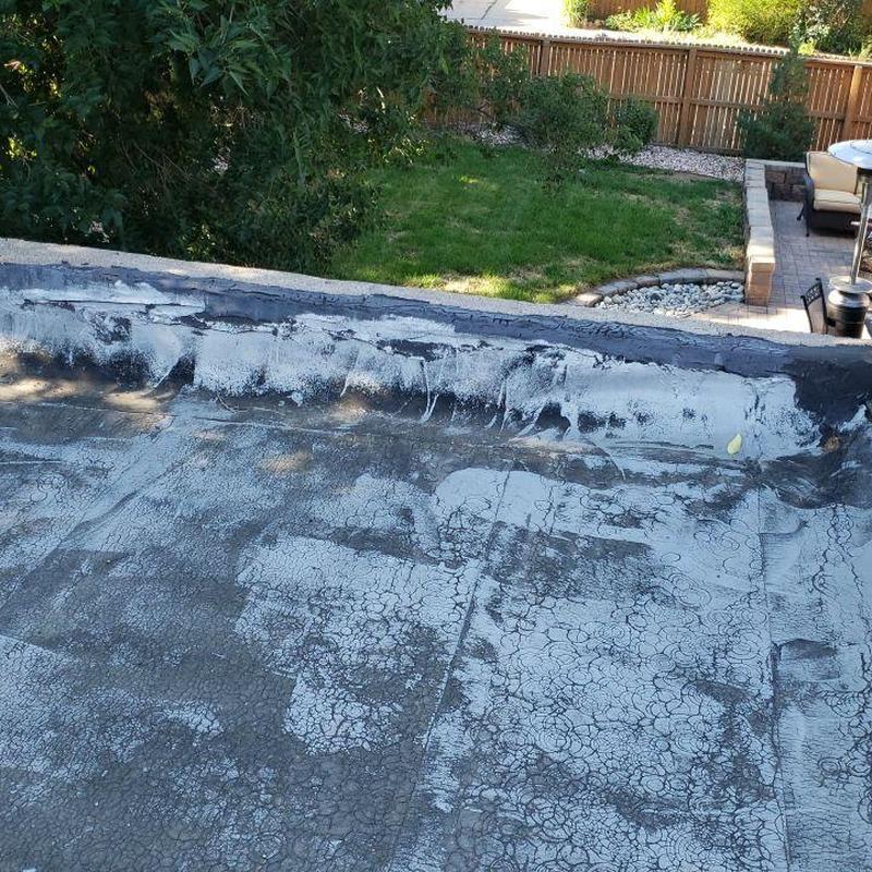 Flat roof with cracking and material separation near drip edge Flat roof with cracking and material separation near drip edge
