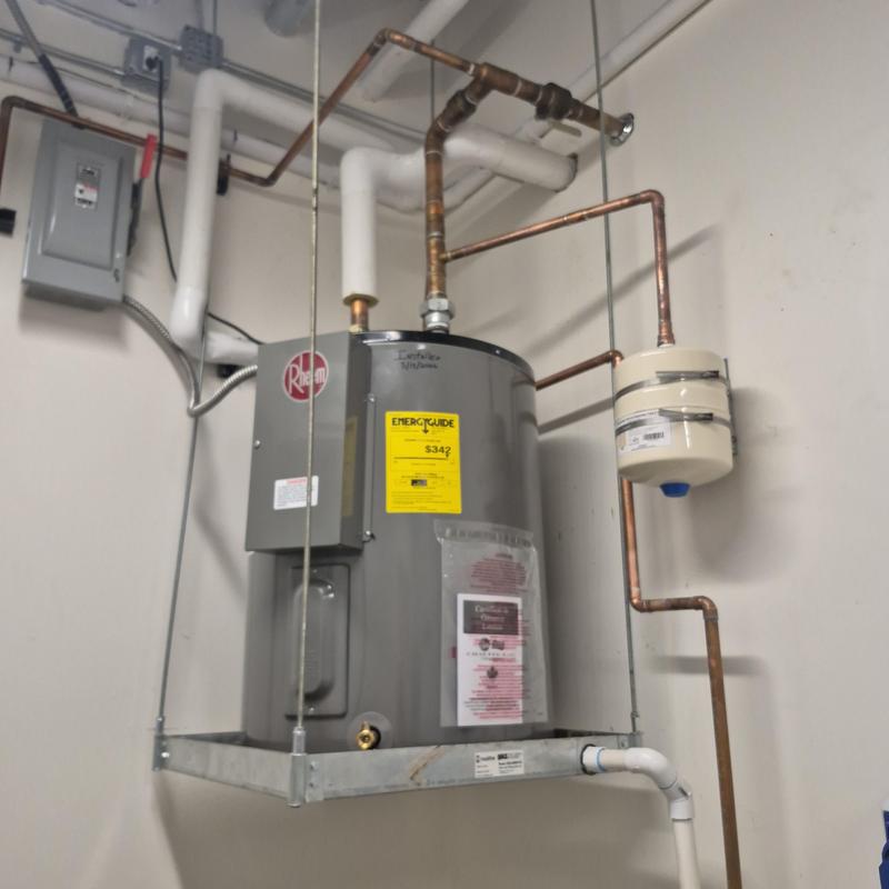 Electric water heater with expansion tank and piping Electric water heater with expansion tank and piping