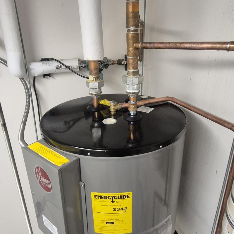 Electric water heater with copper piping installation Electric water heater with copper piping installation
