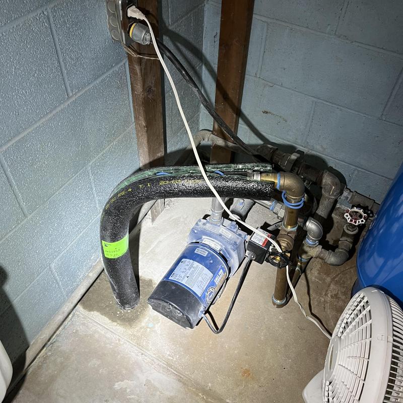 Well pump and poly watermain pipe installation in basement Well pump and poly watermain pipe installation in basement
