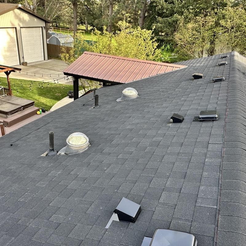 Asphalt shingle roof with vents and skylights inspection Asphalt shingle roof with vents and skylights inspection