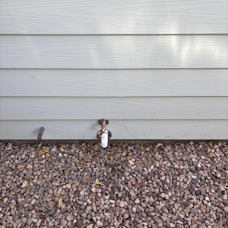 Outdoor water faucet with new copper piping and drain Outdoor water faucet with new copper piping and drain
