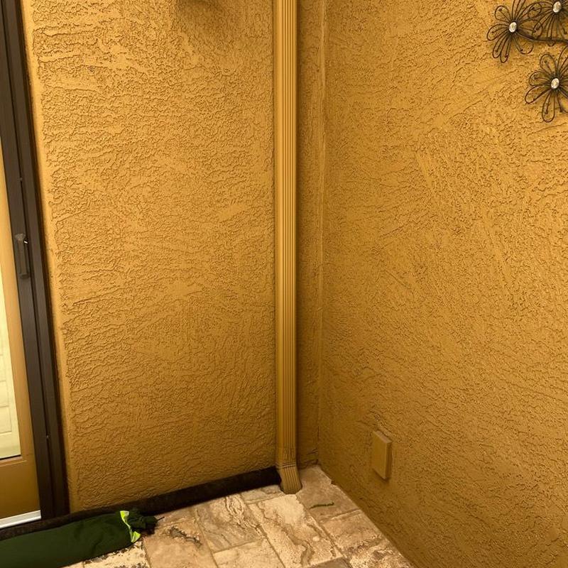 Area drain outlet clearing with mainline snake tool