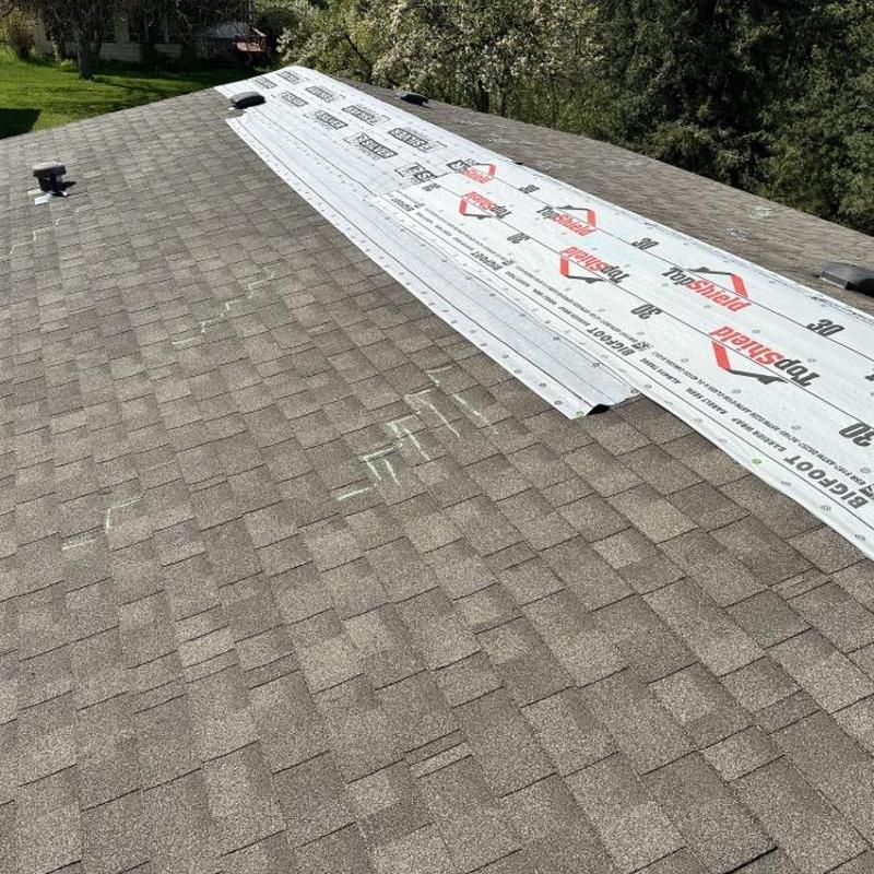 Roof shingles with chalk markings and underlayment installation Roof shingles with chalk markings and underlayment installation