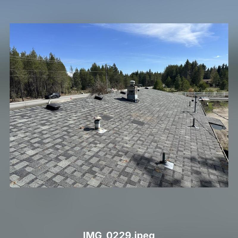 Roof vents and shingle repairs on residential roof Roof vents and shingle repairs on residential roof