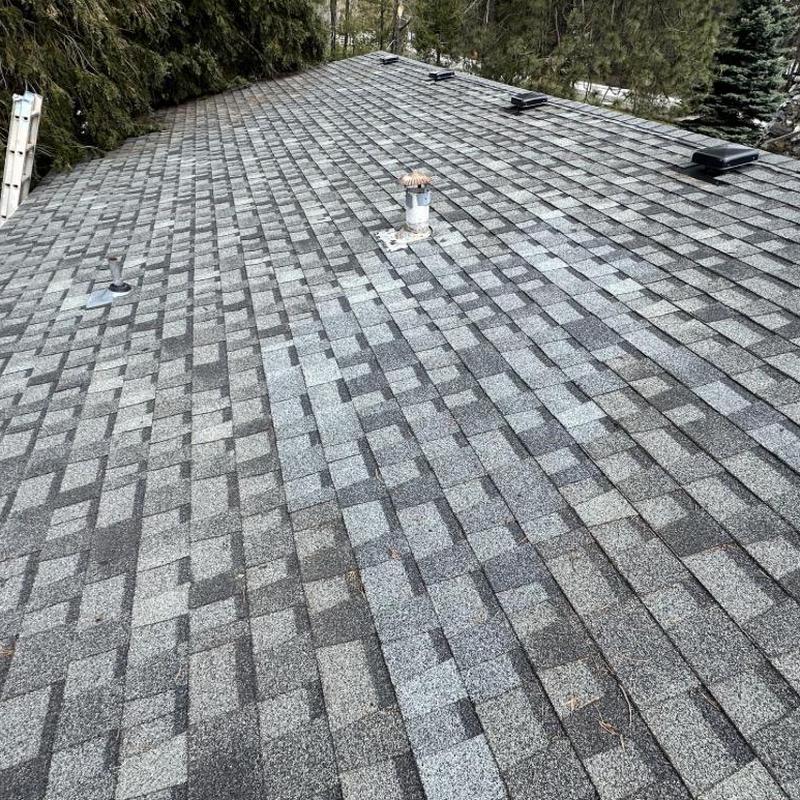 Roof vents and asphalt shingle roof after repairs Roof vents and asphalt shingle roof after repairs