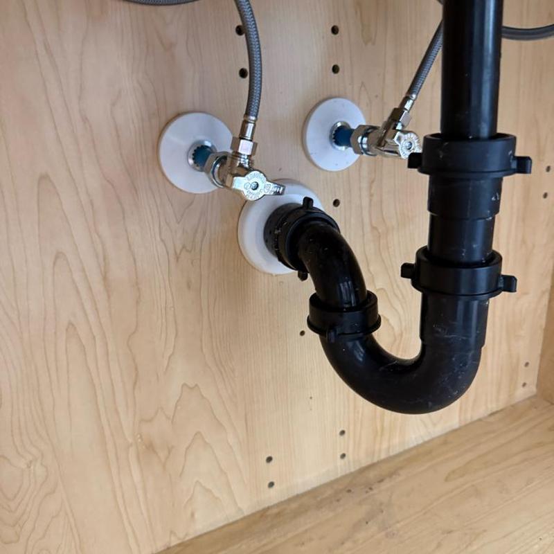 Bathroom faucet supply shut-off valves and drain piping