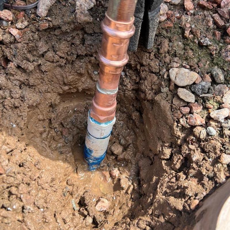 PVC to copper pipe connection leak repair in dirt hole