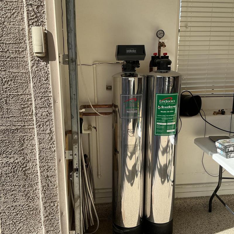 Water softener and filtration tanks installed indoors Water softener and filtration tanks installed indoors