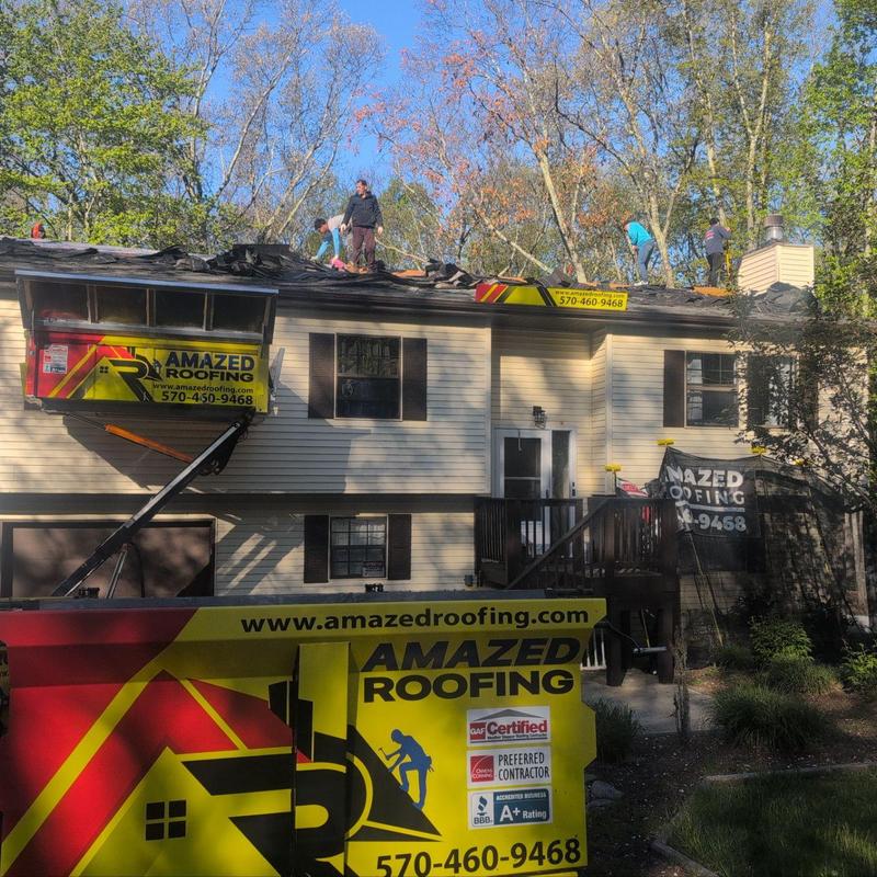 Owens Corning Peppercorn roof shingle removal in progress Owens Corning Peppercorn roof shingle removal in progress