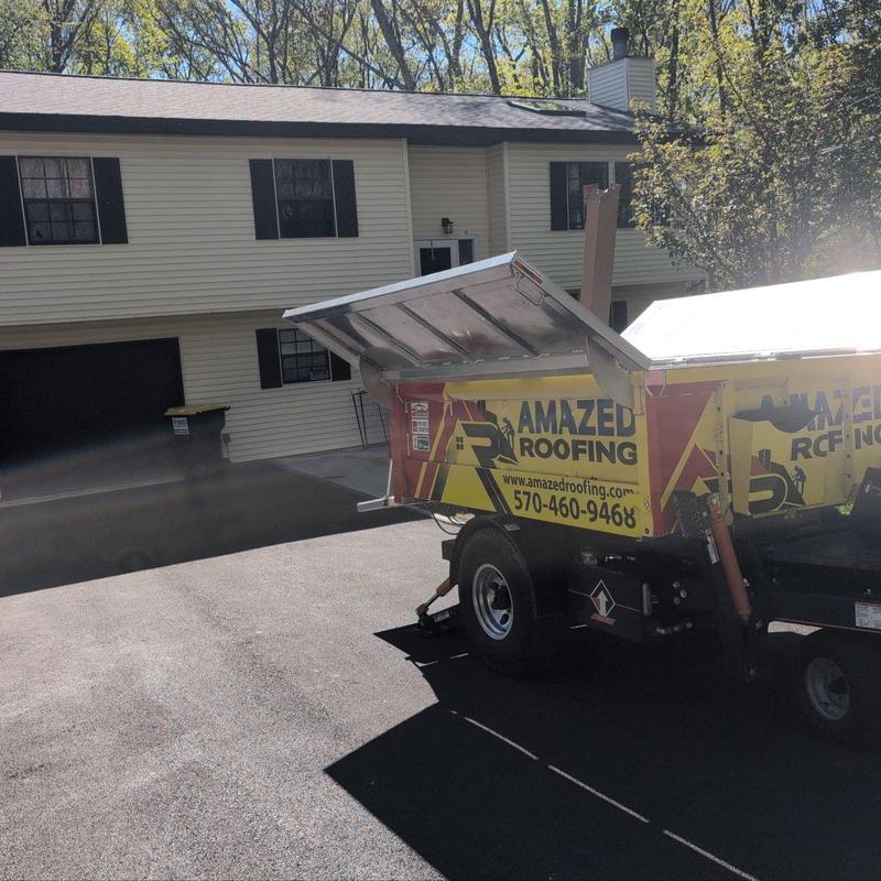 Roofing trailer with Amazed Roofing branding Roofing trailer with Amazed Roofing branding