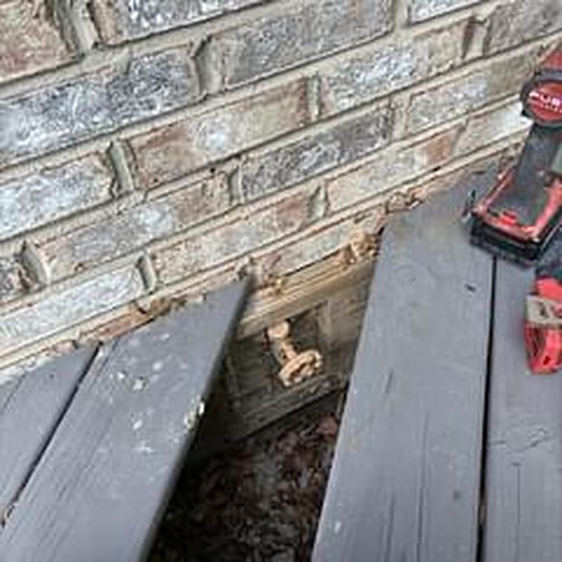 Hose bib installation with easy access under deck boards
