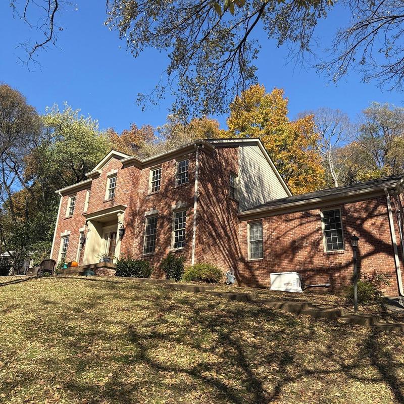 Asphalt shingle roof with hail damage inspection