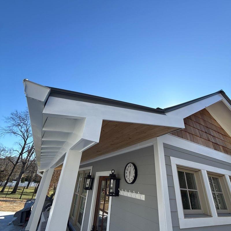 Gutter system and roof edge on residential home facade
