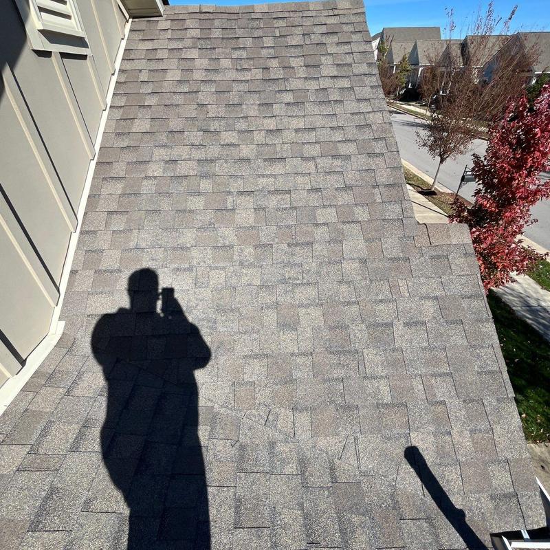 Asphalt shingles with hail damage on residential roof