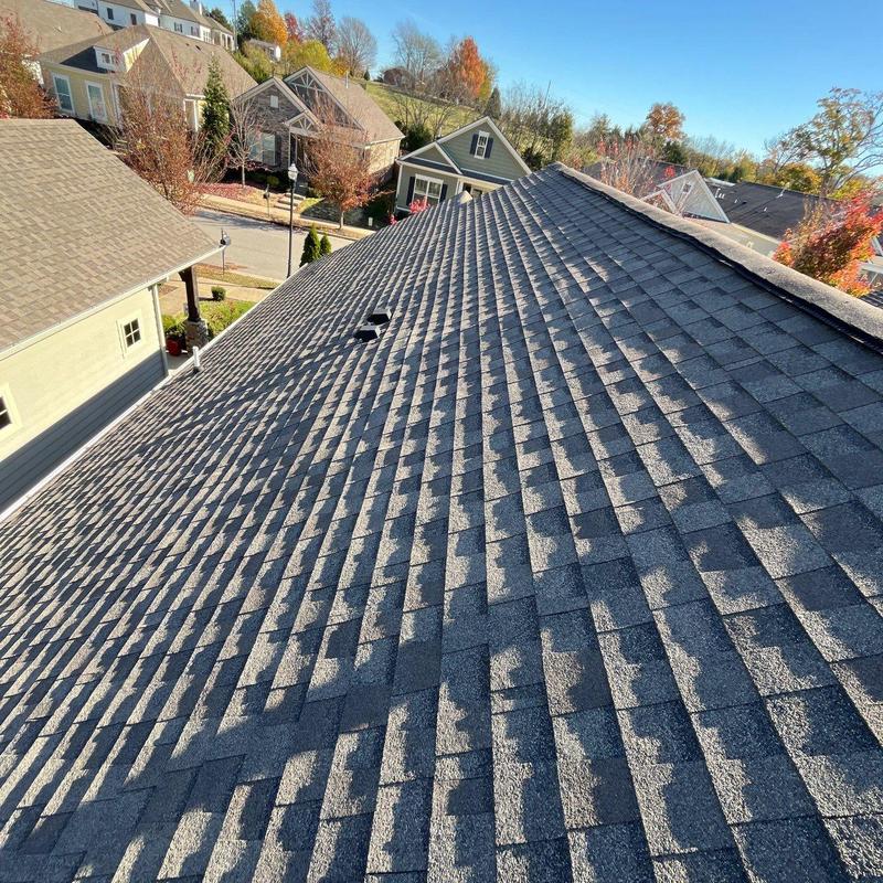 Asphalt shingle roof with ridge vent inspection