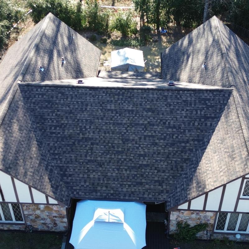 Architectural shingle roof with clean ridge lines Architectural shingle roof with clean ridge lines