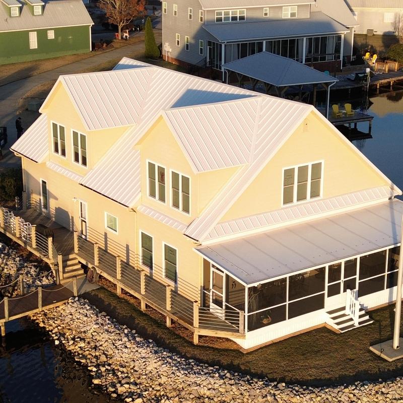 Standing seam metal roof on waterfront home Standing seam metal roof on waterfront home