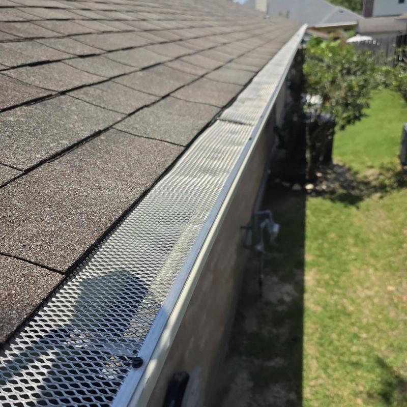 Gutter guard installation on architectural shingle roof Gutter guard installation on architectural shingle roof
