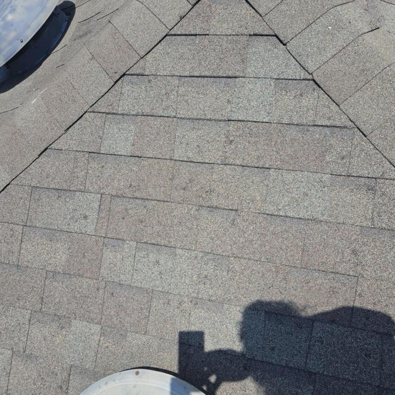 Architectural shingle roof section inspection after hailstorm Architectural shingle roof section inspection after hailstorm