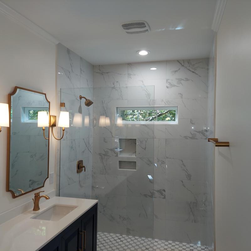 Marble shower walls and built-in niche in bathroom Marble shower walls and built-in niche in bathroom
