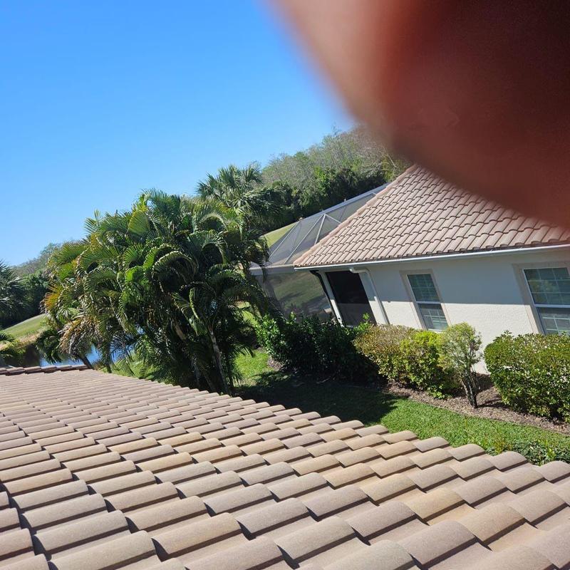 Concrete tile roof with foam adhesion in Naples, FL Concrete tile roof with foam adhesion in Naples, FL