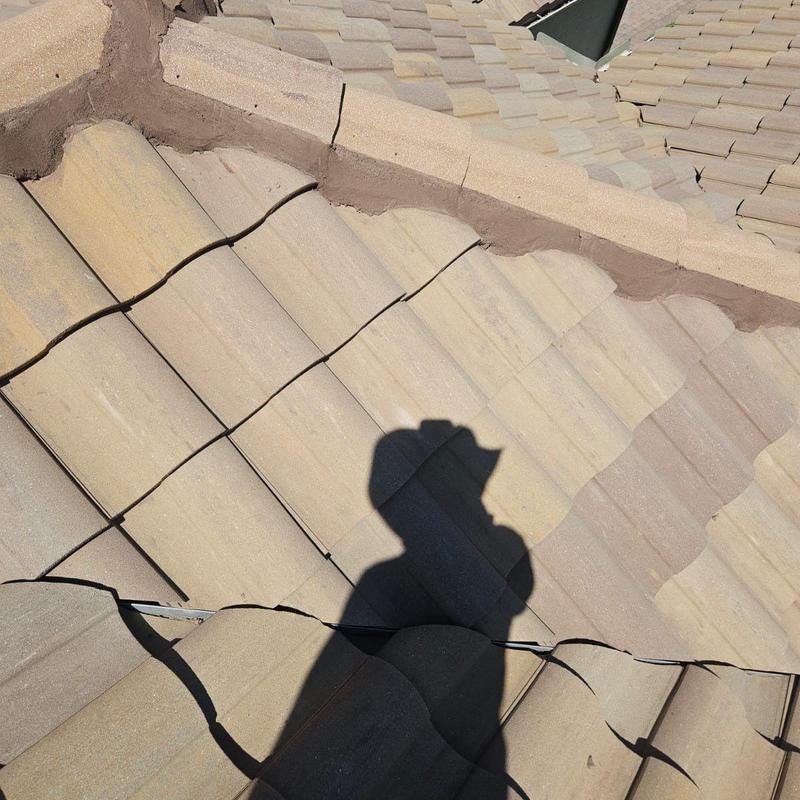 Concrete tile roof with foam-adhered ridge in Naples FL Concrete tile roof with foam-adhered ridge in Naples FL