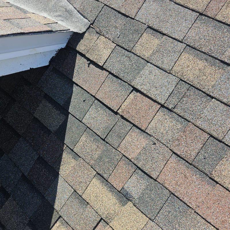 Asphalt shingle roof repaired with new decking and underlayment Asphalt shingle roof repaired with new decking and underlayment
