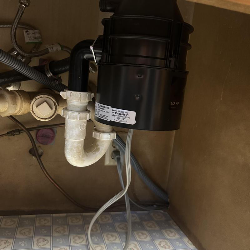 Garbage disposal installation with new half horsepower unit Garbage disposal installation with new half horsepower unit